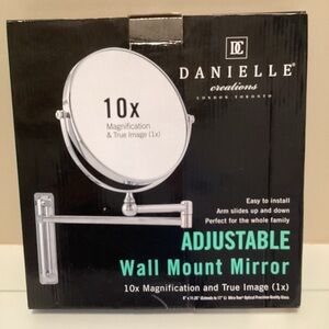 Danielle creations wall mount mirror 10X magnification and reverses to 1X.